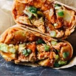bbq chicken burritos cut in half and stacked.